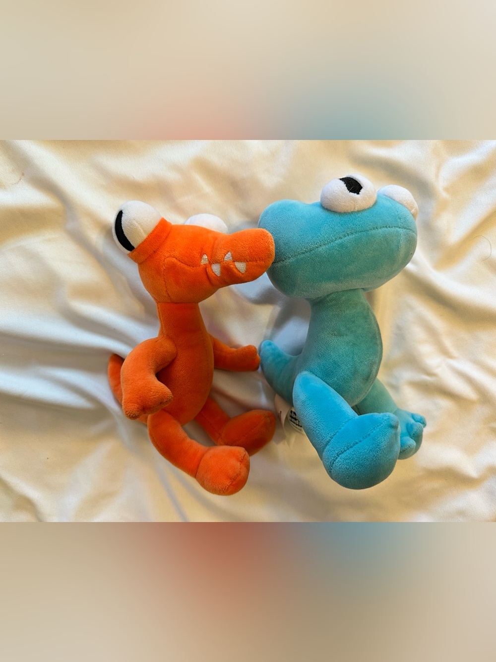 Rainbow friends orange and cyan